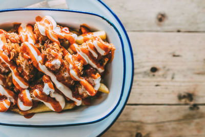 High angle view of fried chicken with fries