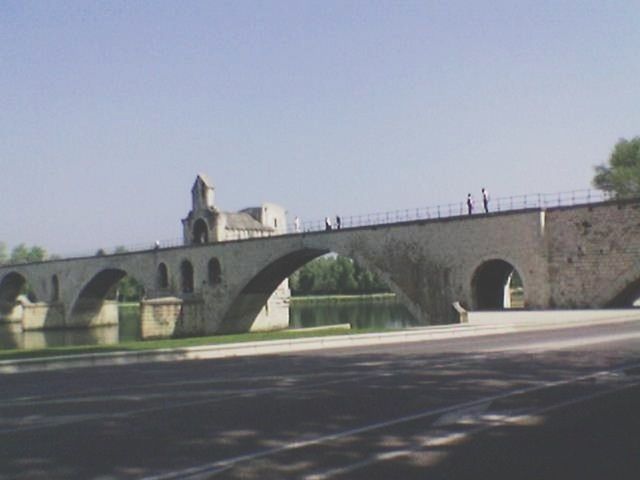 architecture, built structure, clear sky, transportation, bridge - man made structure, connection, road, copy space, arch, bridge, building exterior, road marking, street, car, engineering, day, outdoors, the way forward, city, sky