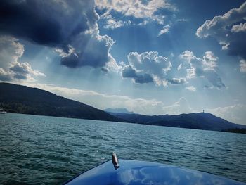 Scenic view of sea against mountains