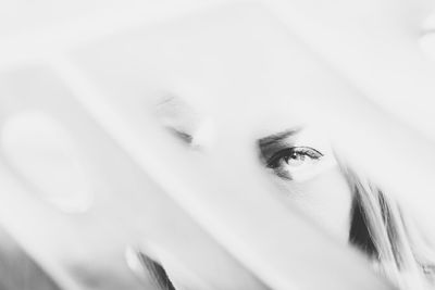 Close-up of woman wearing hat