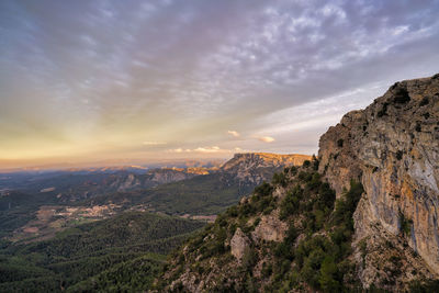 Scenic view of landscape against sky during sunset