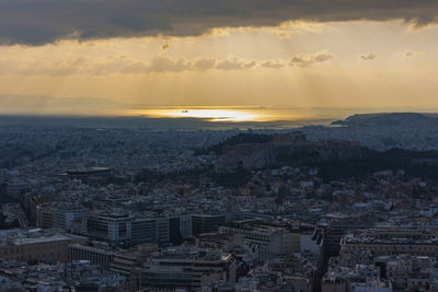 High angle view of city at sunset