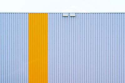 Close-up of yellow wall of building