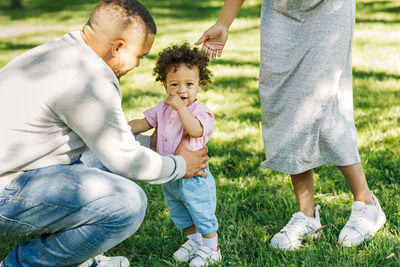 Parents with toddler son at park