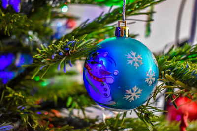 Close-up of christmas decoration hanging on tree