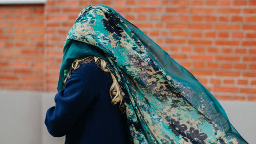 Portrait of a girl covered with a scarf