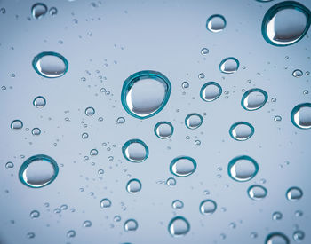 Close-up of water drops on glass