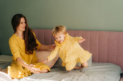 Mother and daughter at home