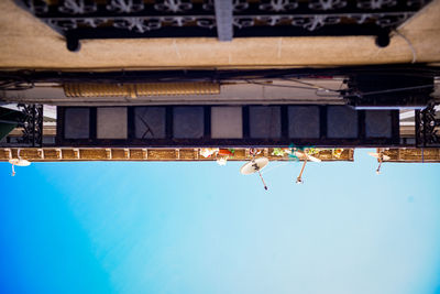 Clothes hanging against sky