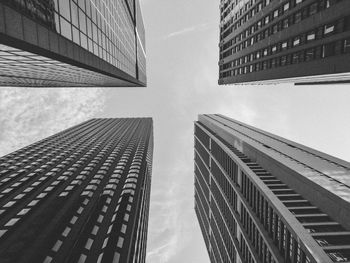 Low angle view of modern buildings against sky