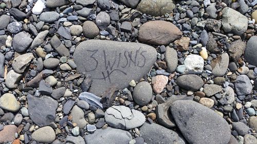 High angle view of stones on pebbles