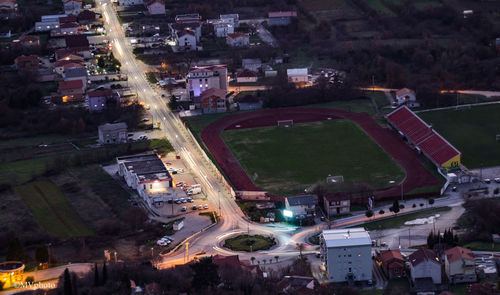 High angle view of illuminated buildings at night