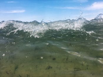 Sea waves splashing on beach