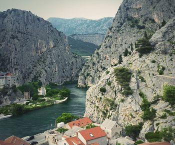 Scenic view of river and mountains
