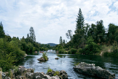 Scenic view of river against sky