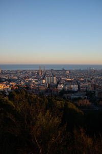 High angle view of buildings against clear sky