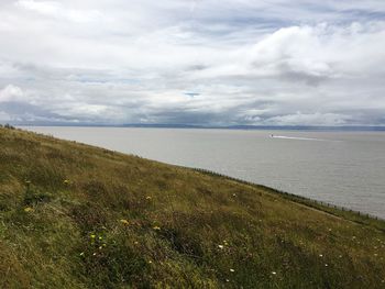 Tranquil view of seascape against sky