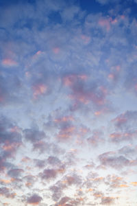 Low angle view of clouds in sky during sunset