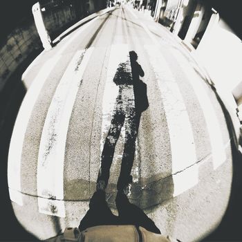Shadow of person on subway station