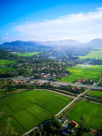 Aerial view of agricultural field against sky