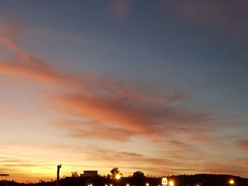 Low angle view of dramatic sky during sunset