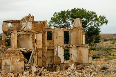 Abandoned built structure against sky