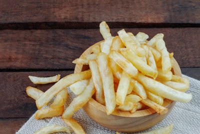 Close-up of french fries on table