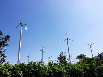 Low angle view of windmill against clear sky