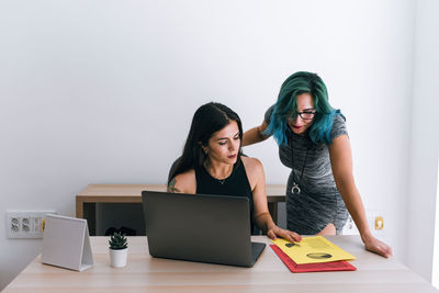 Young business women working in a coworking office