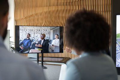 Office workers making video call to colleagues