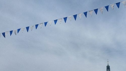 Low angle view of birds against sky