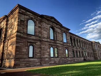 Low angle view of old building against sky