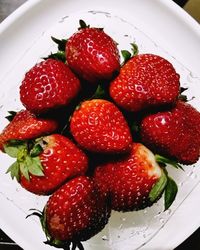 High angle view of strawberries in plate