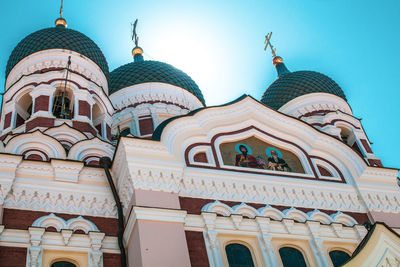 Low angle view of ornate building against sky