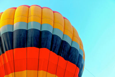 Cropped image of hot air balloon in clear sky