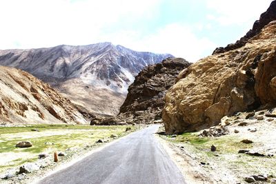 Road leading towards mountains