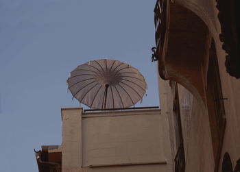 Low angle view of old building against clear sky