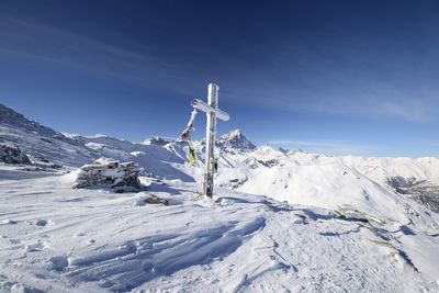 Snow covered mountain against sky