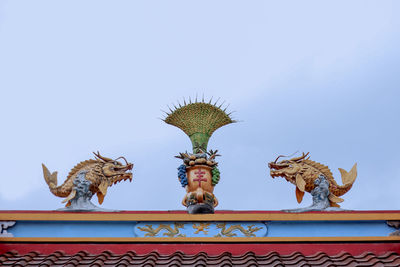 Low angle view of statue against clear sky