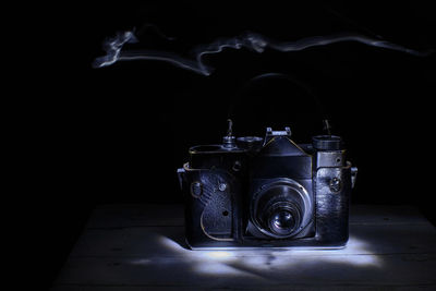 Close-up of fire hydrant against black background