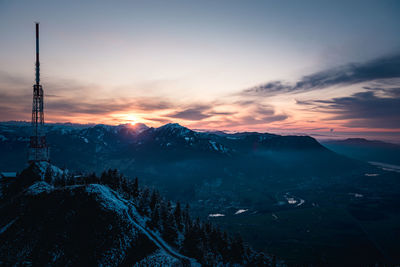 Scenic view of mountains against sky during sunset