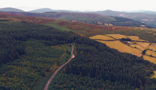 High angle view of landscape and mountains against sky