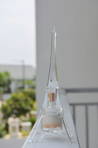 Close-up of glass bottle on table