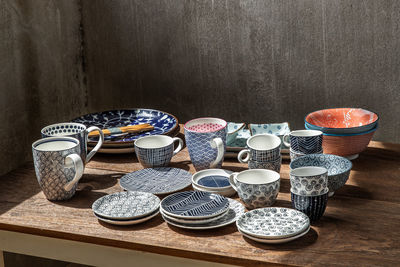 Close-up of coffee cups on table