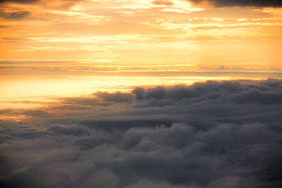 Low angle view of dramatic sky during sunset