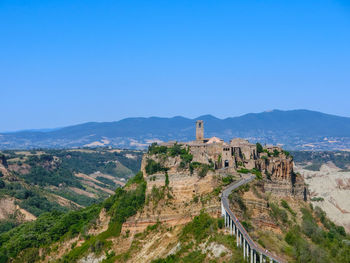 High angle view of castle against blue sky