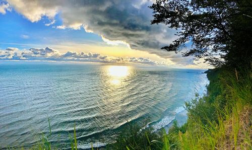 Scenic view of sea against sky during sunset