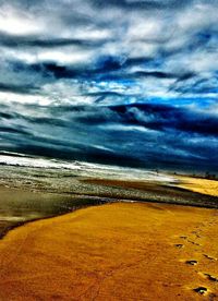 Scenic view of beach against sky