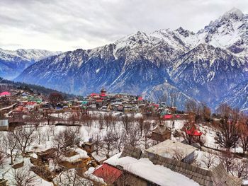 Scenic view of snowcapped mountains against sky