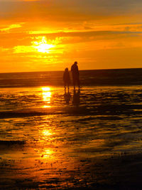 Scenic view of sunset over sea